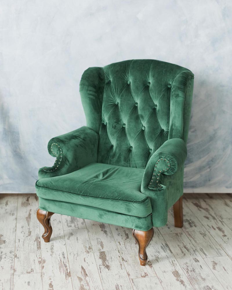 green velvet wooden chair repaired with glue